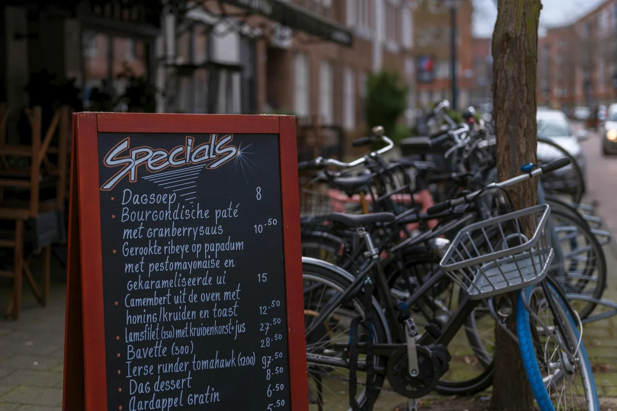 Mike Castillo, founder of Summit Shield Roofing, standing beside a completed roof installation